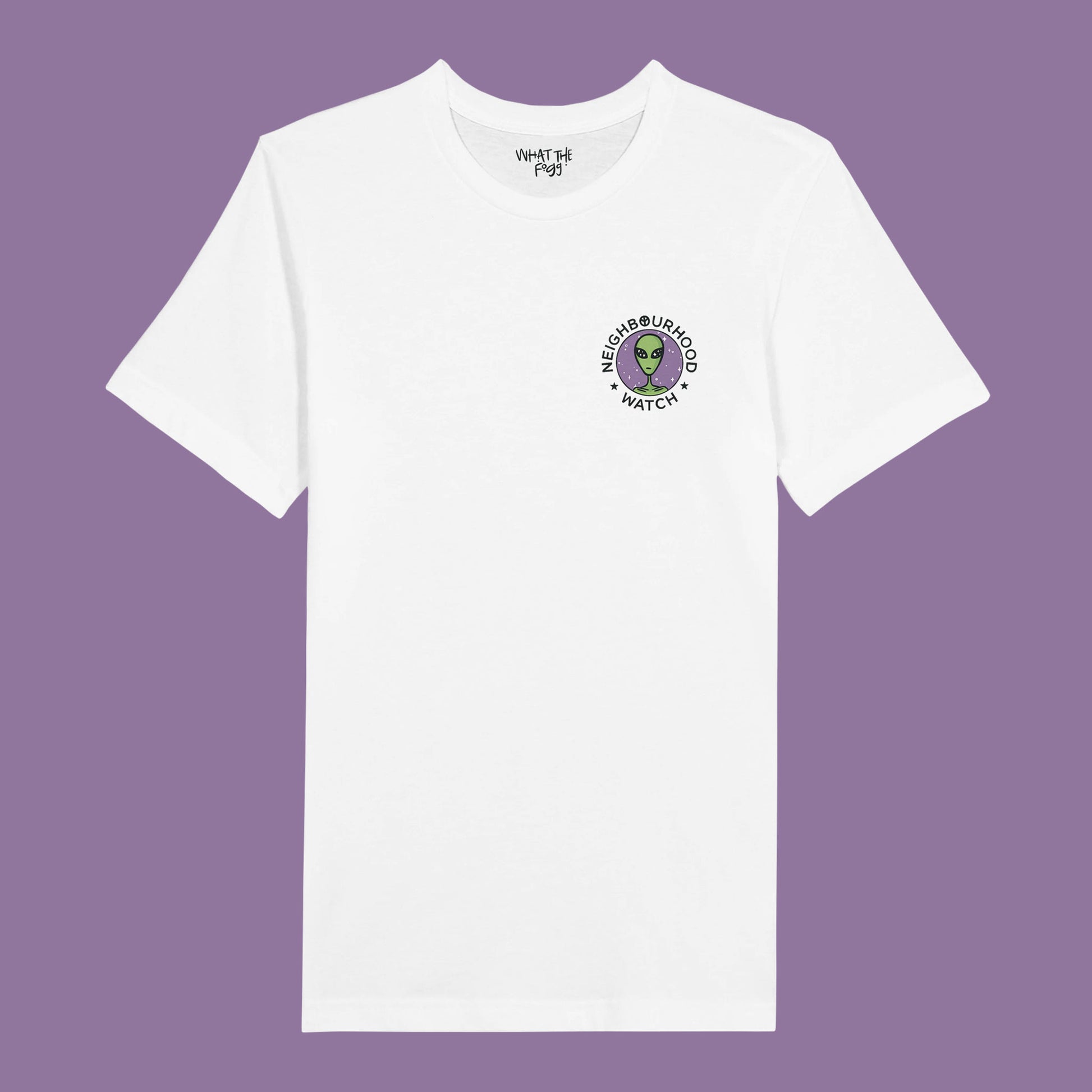 White t-shirt featuring a playful twist on the traditional Neighbourhood Watch poster. The front of the shirt displays a circular badge with a design of aliens instead of people. The badge is surrounded by the text 'Neighbourhood Watch' in a bold, eye-catching font.