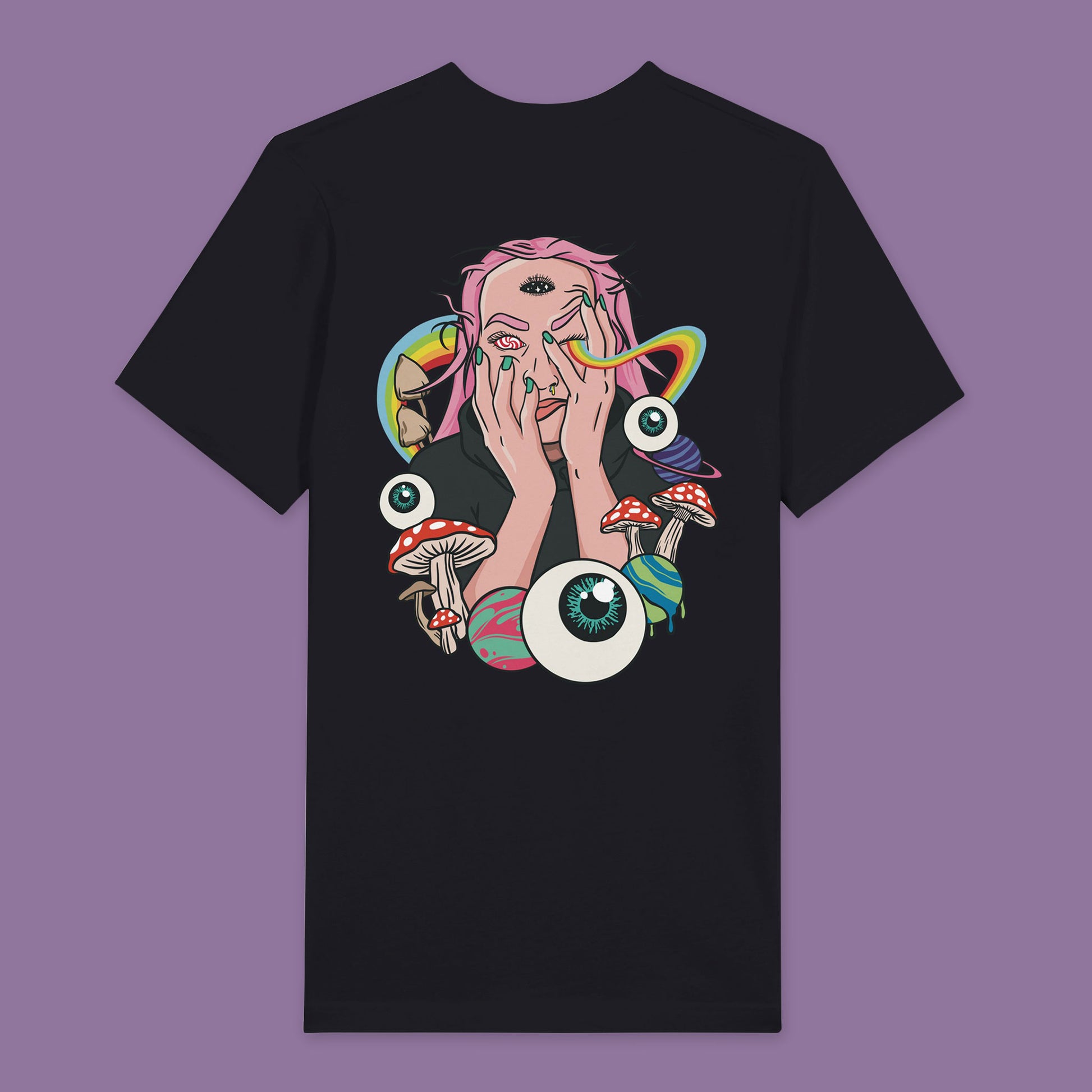 Back view of a black T-shirt featuring a psychedelic illustration of a trippy person with a third eye, with a rainbow emanating from the eye. The design is surrounded by planets, eyeballs, and mushrooms.