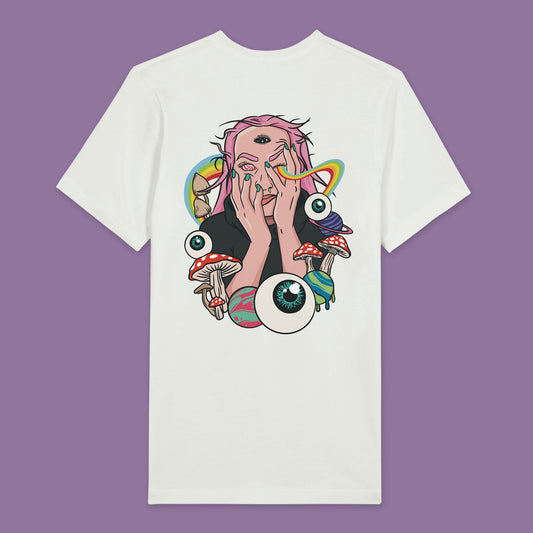 Back view of a white T-shirt featuring a psychedelic illustration of a trippy person with a third eye, with a rainbow emanating from the eye. The design is surrounded by planets, eyeballs, and mushrooms.