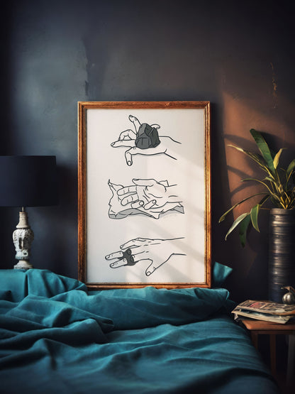 Framed artwork with quirky illustration drawing of hand game rock, paper, scissors with a twist or gore on a wall above a bed with teal bedding.