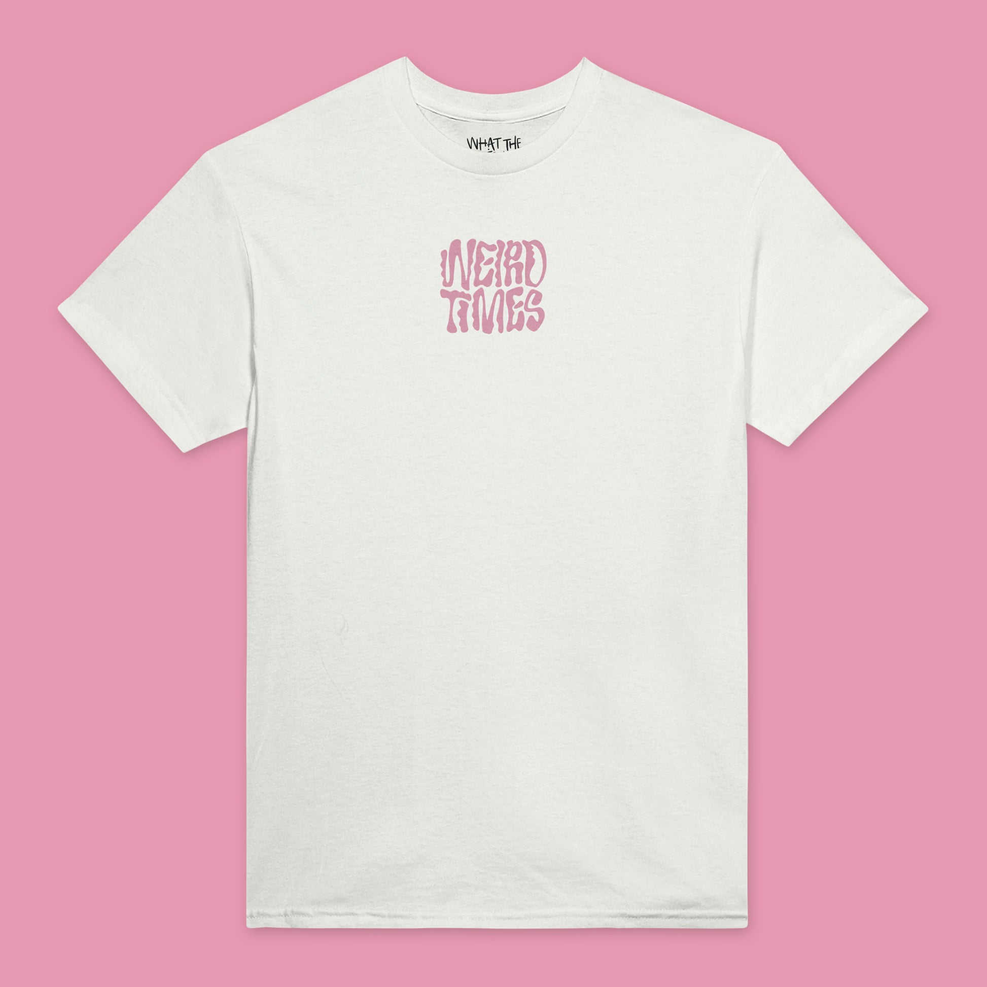 White T-shirt with 'Weird Times' printed in pink in the centre of the front.